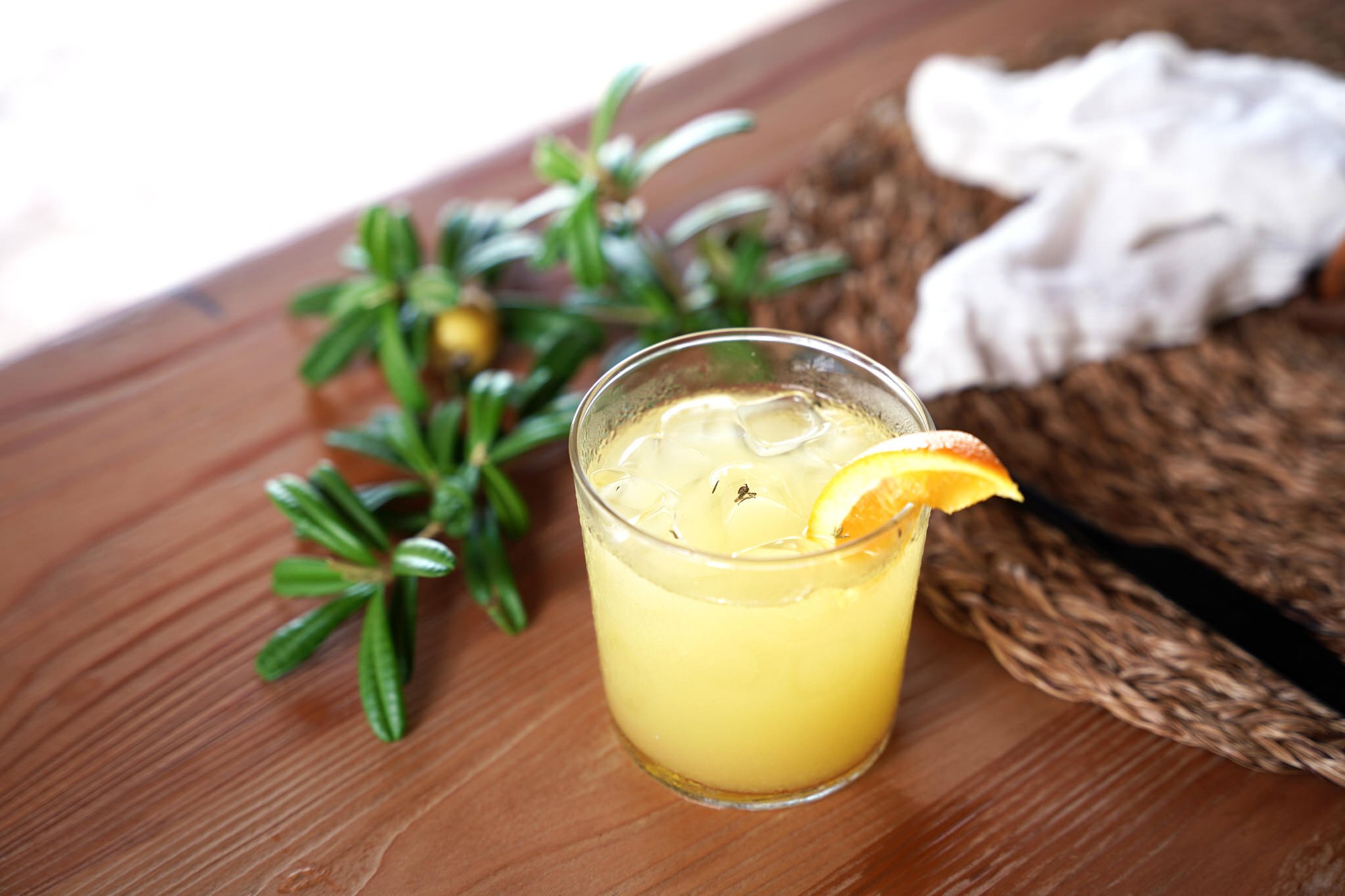 Citrus drink garnished with rosemary at The Aerial BVI