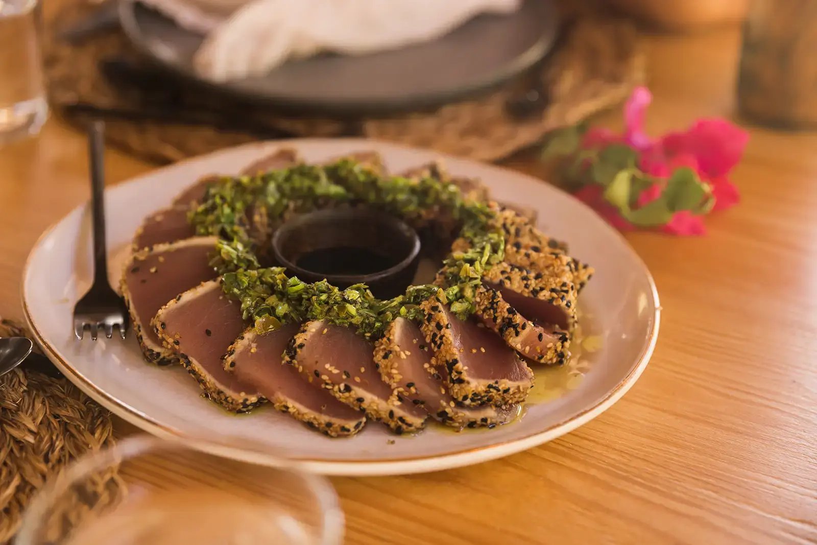 Plated seared dish garnished with greens at The Aerial, BVI