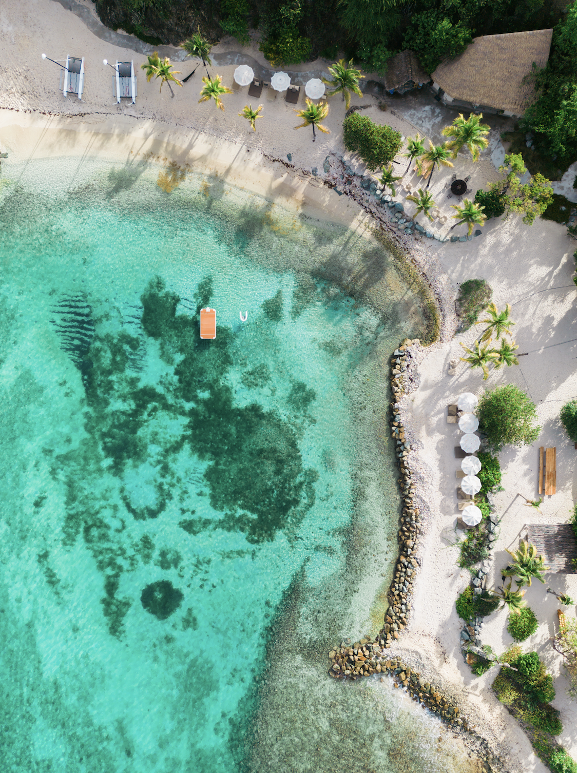 Aerial drone view of The Aerial, BVI's turquoise coastline.