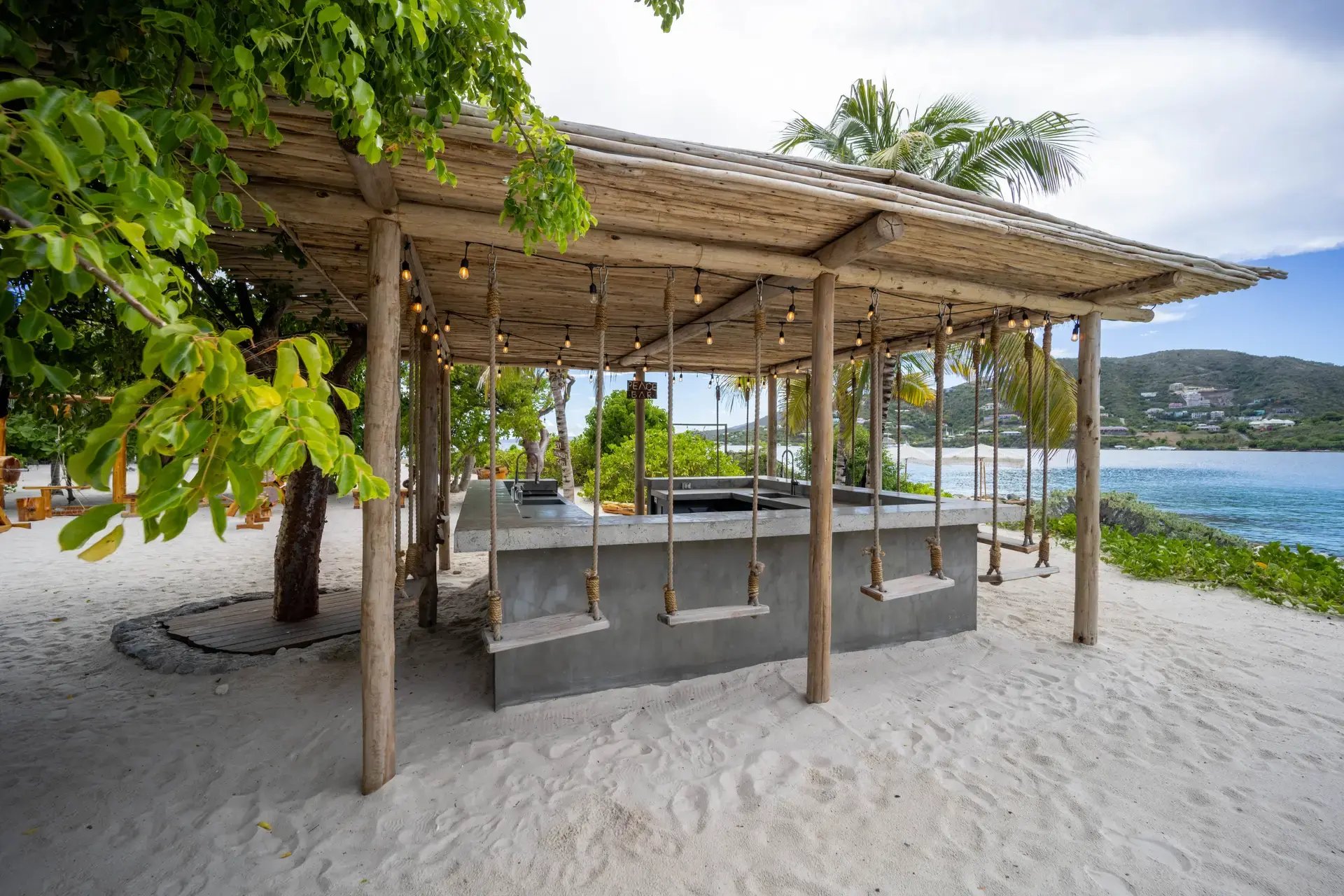 Beach gym with hanging TRX-style swings at The Aerial BVI