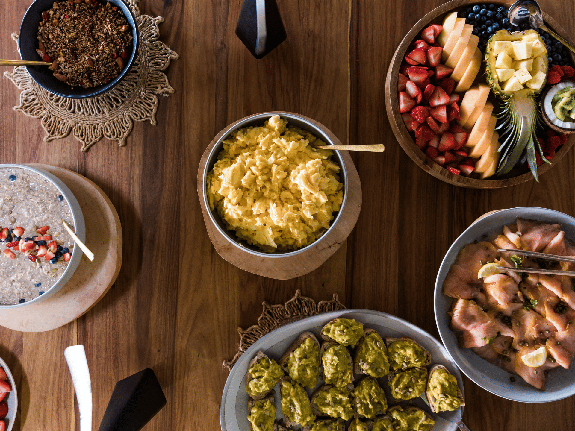 Overhead view of small plates and bowls of food at The Aerial BVI