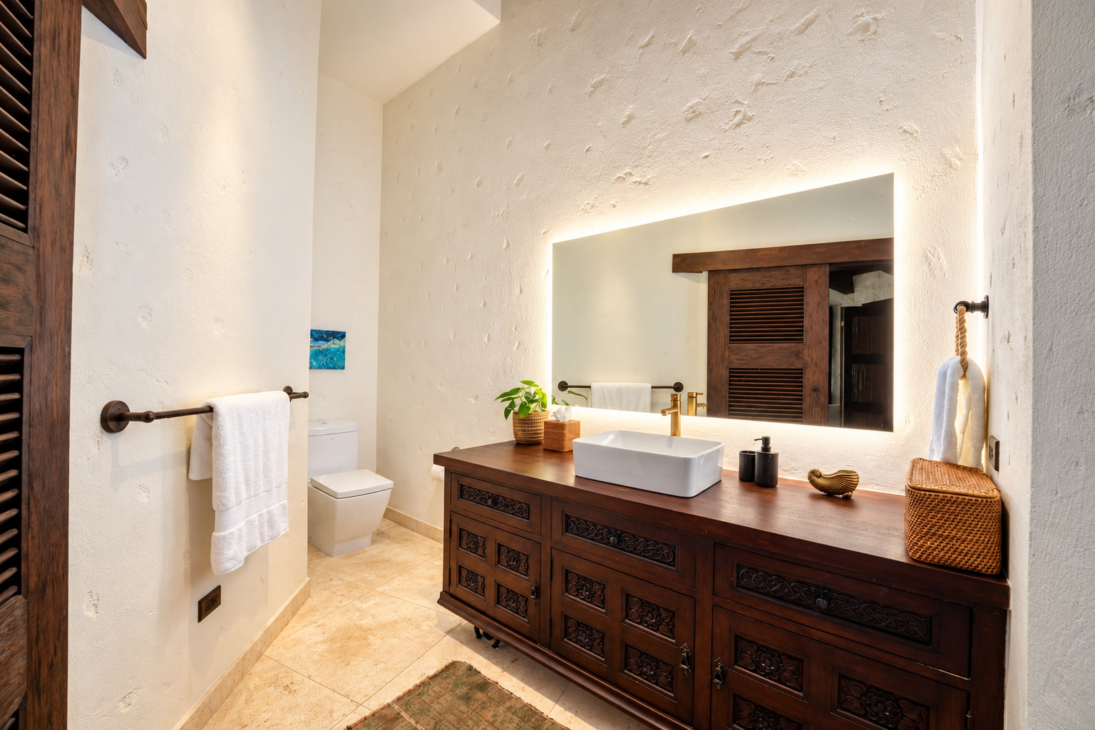 Bathroom vanity with backlit mirror at The Aerial, BVI
