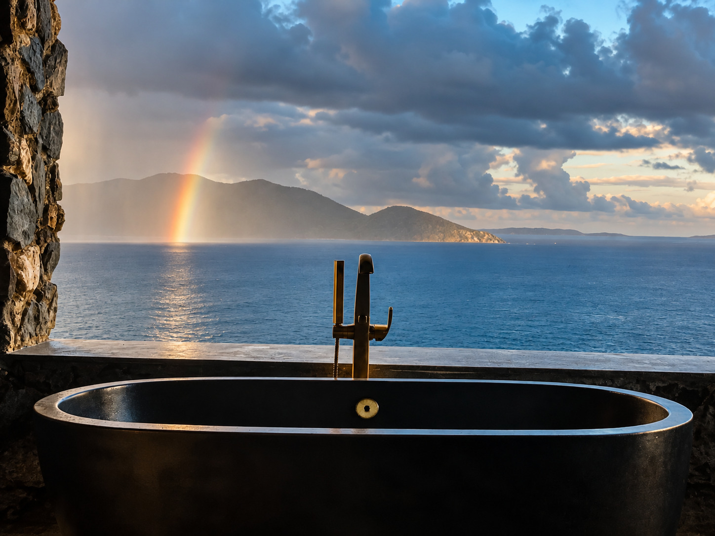 Freestanding tub with rainbow ocean view at The Aerial, BVI
