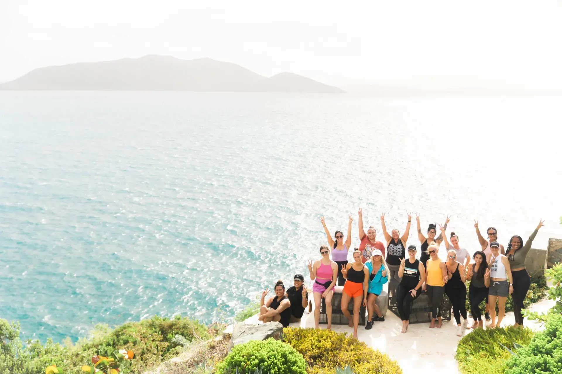 Group photo session overlooking the ocean at The Aerial, BVI