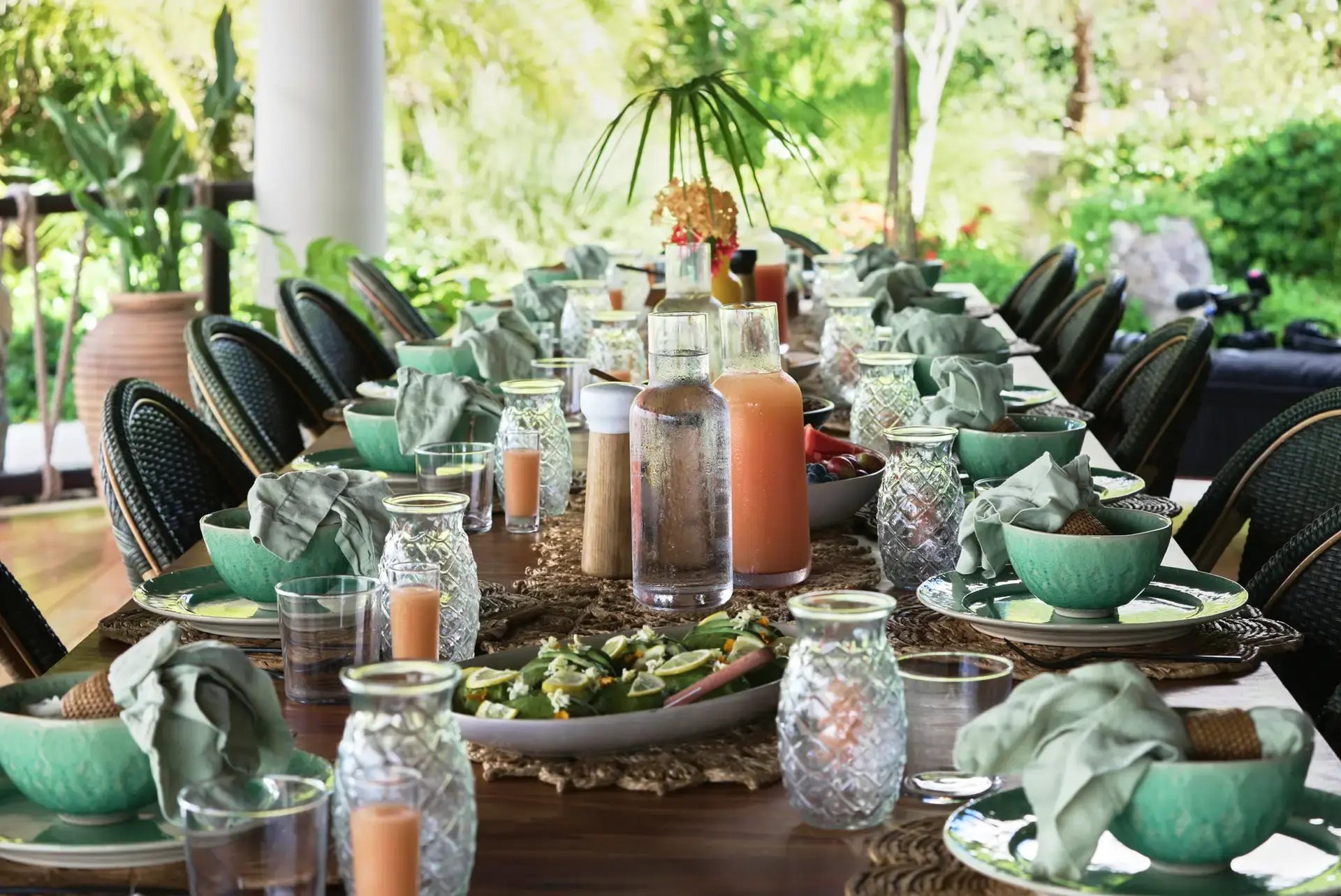 Long table set with tableware overlooking the ocean at Solar Deck, The Aerial BVI