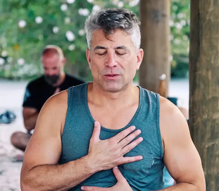 Guest in a breathwork session at HEAL Retreat, The Aerial, BVI