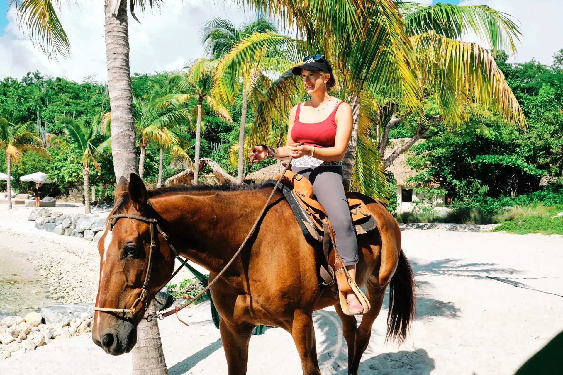 Guest horseback riding along the coastal path at The Aerial BVI