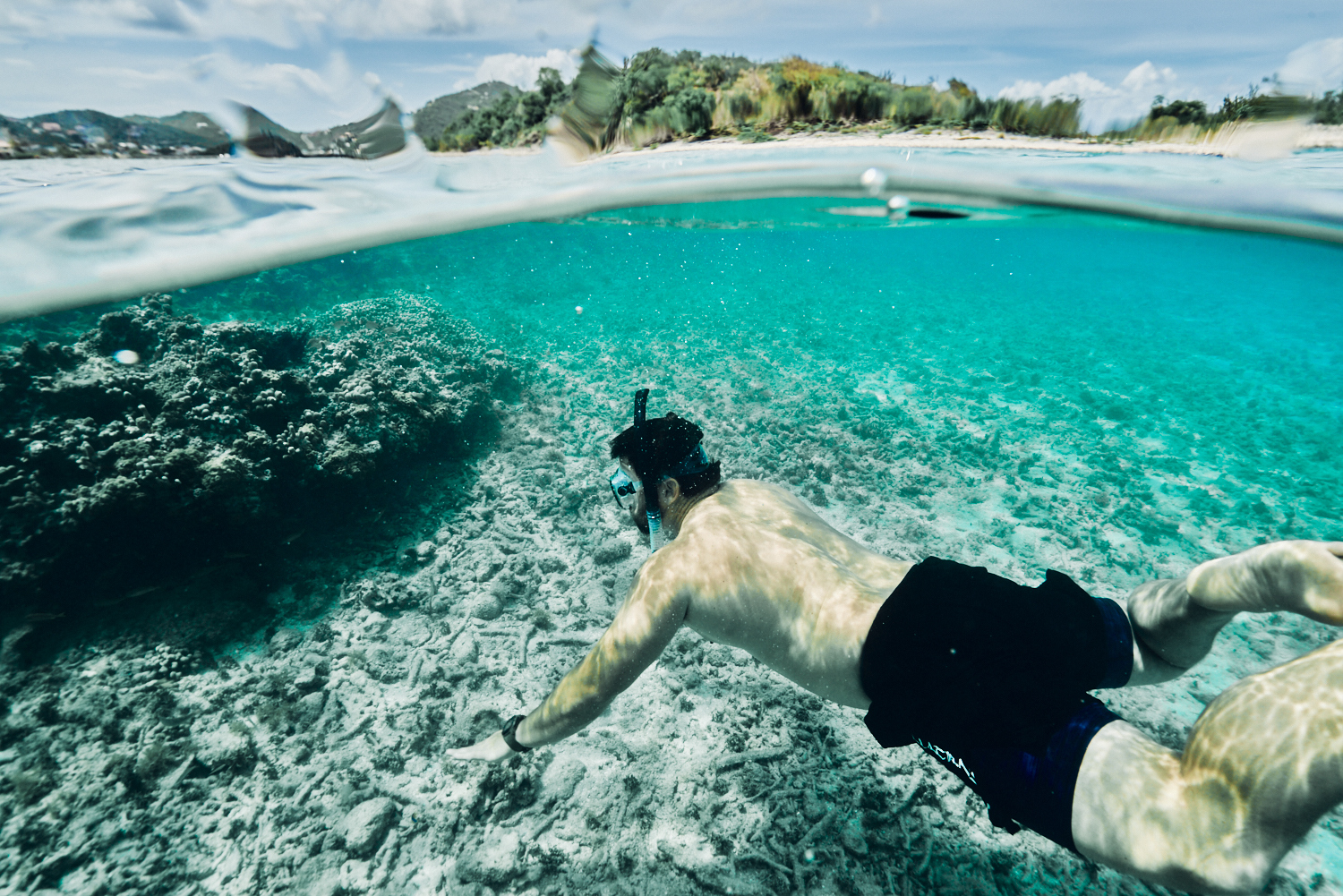 Guest snorkeling in shallow water at The Aerial BVI