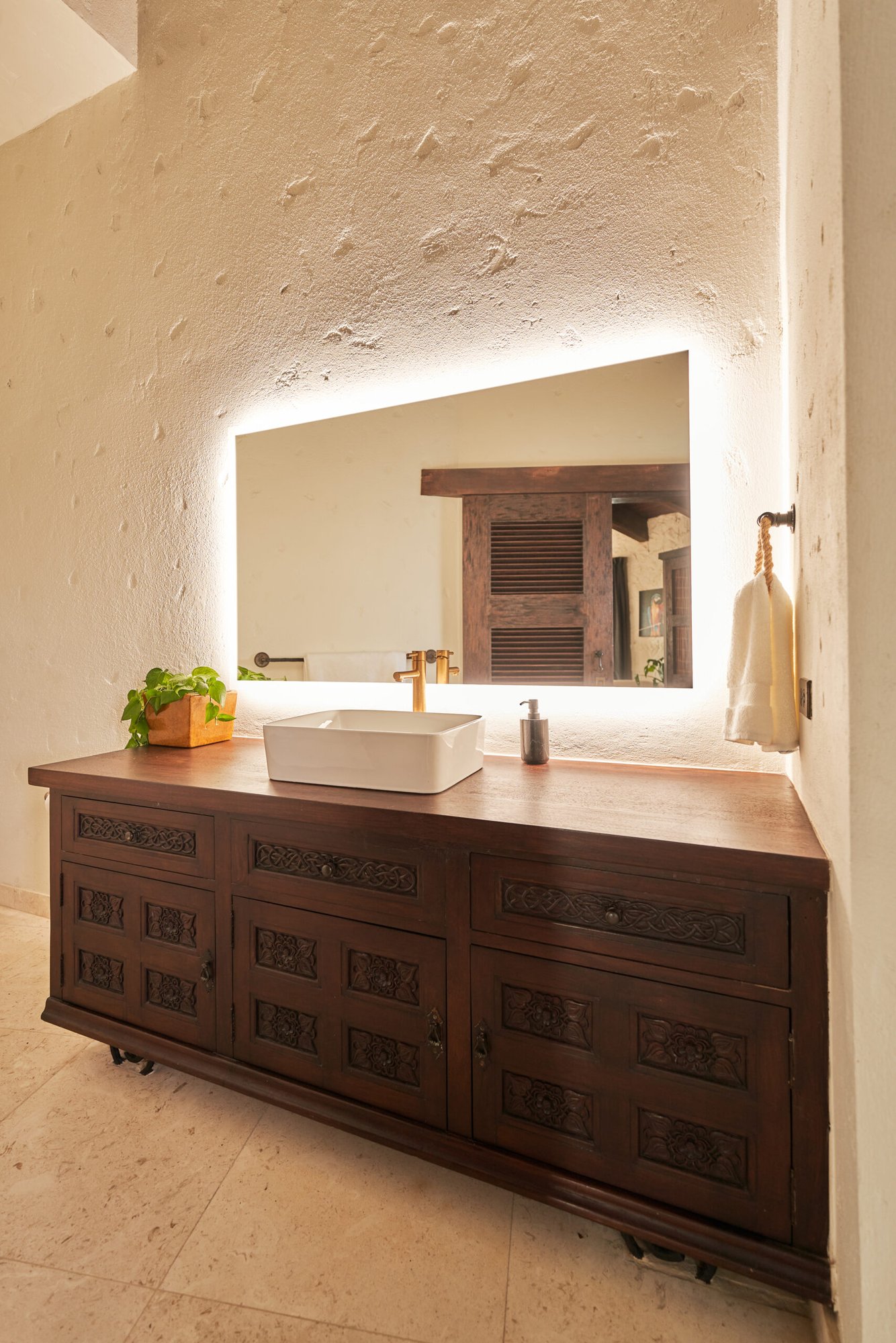 Bathroom vanity with backlit mirror at The Aerial, BVI