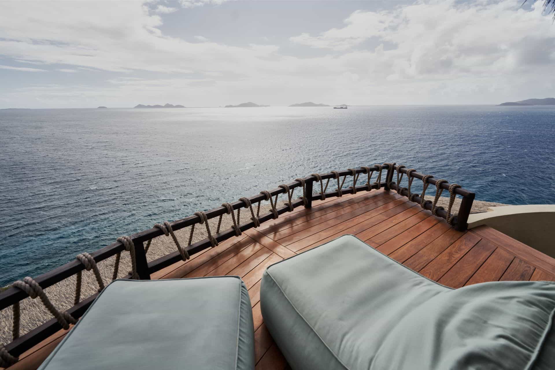 Ocean view lounge chairs on a private deck at The Aerial, BVI