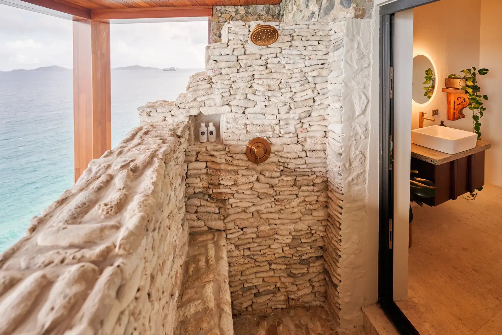 Outdoor stone shower with ocean view at The Aerial, BVI