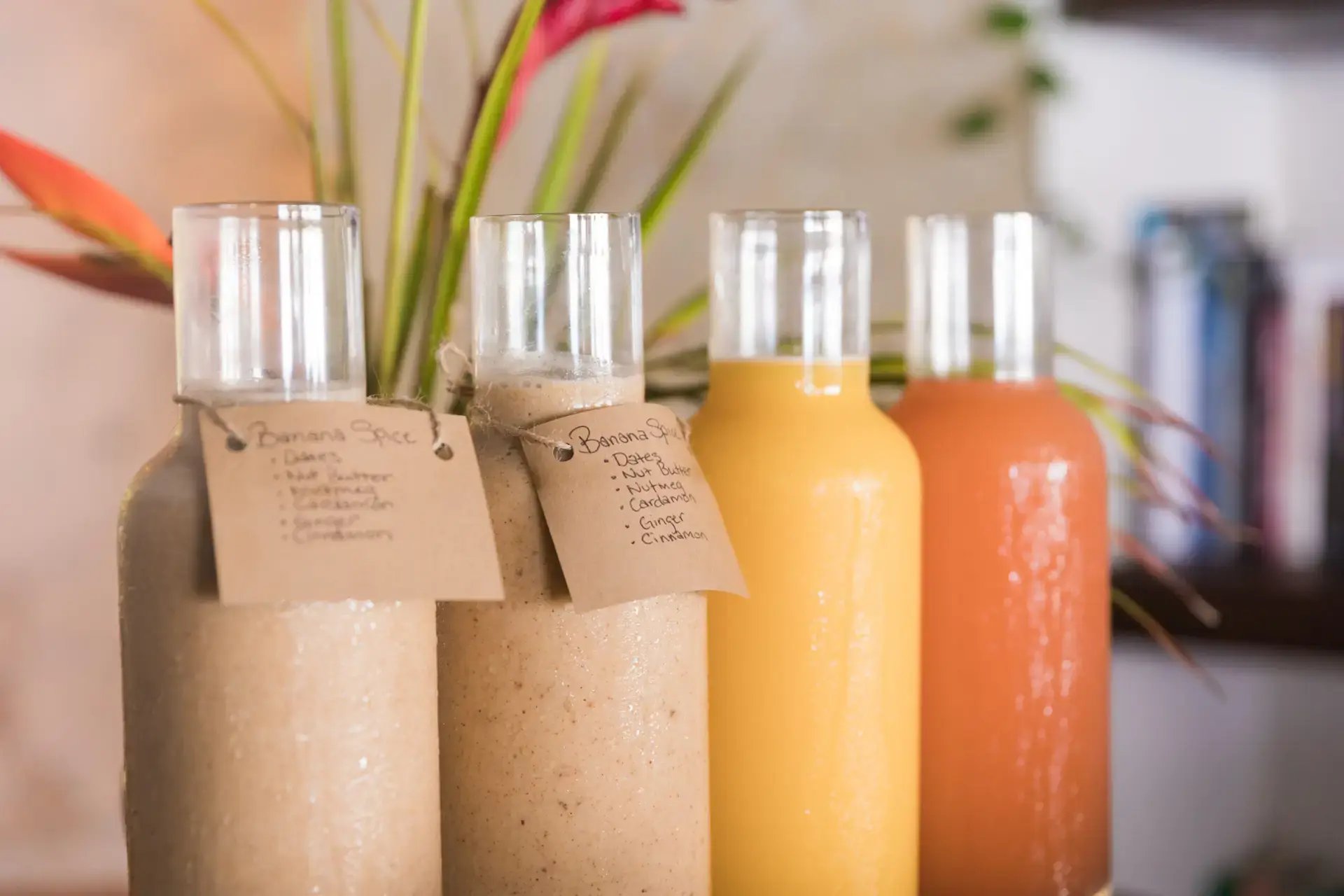 Bottled fresh juices with handwritten labels at The Aerial BVI