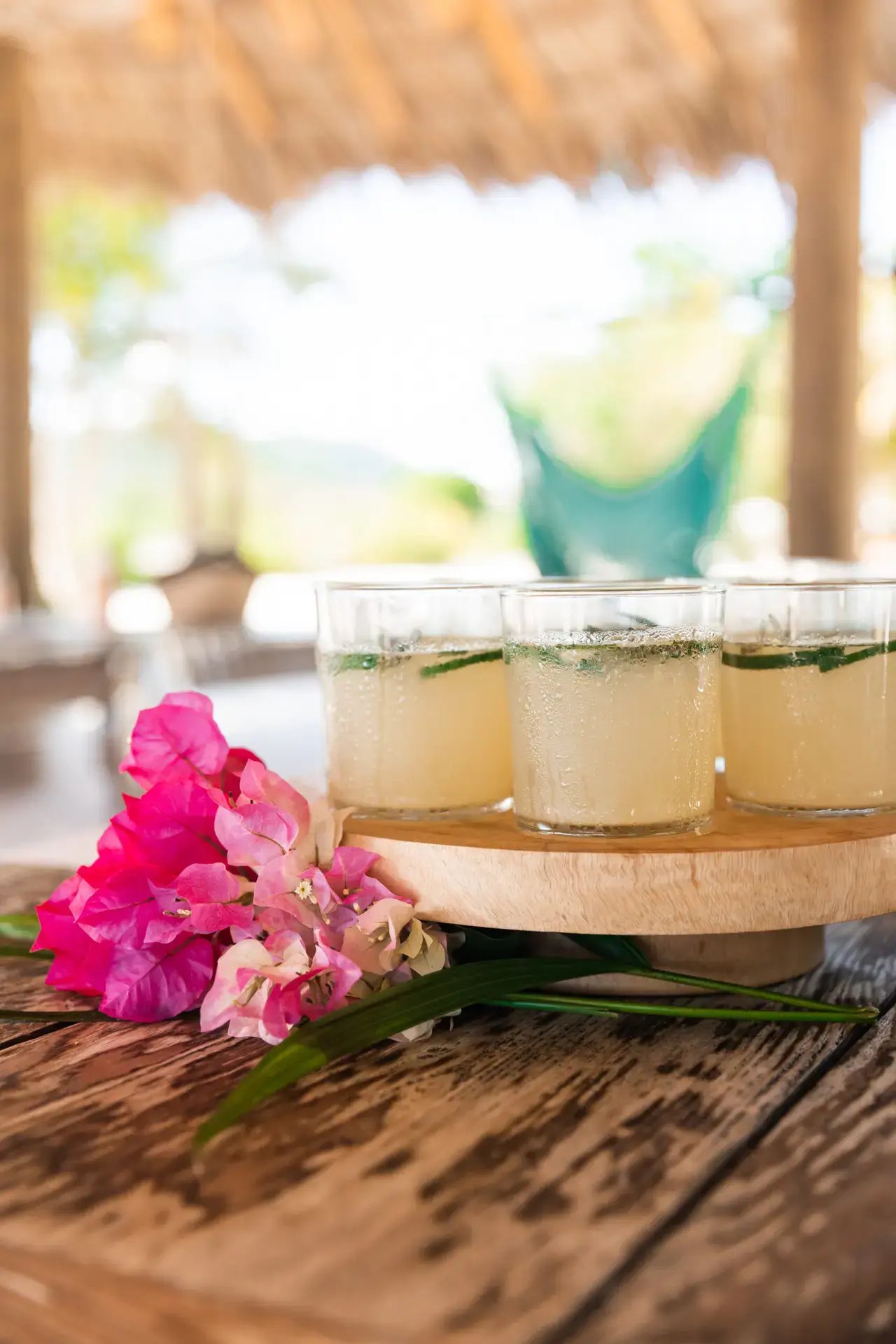 Curated drinks served on a wooden tray at The Aerial, BVI