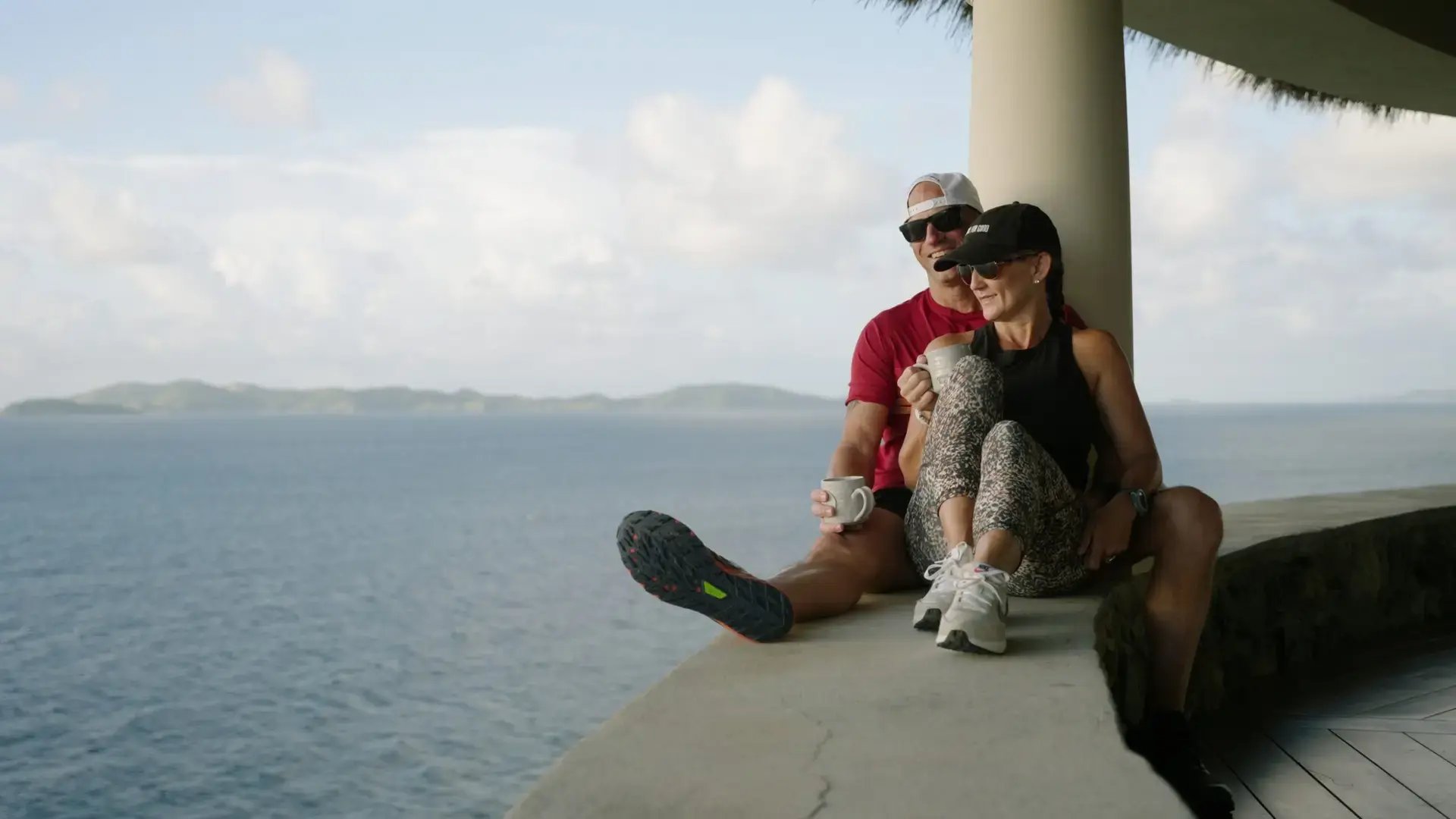 Guests sitting together and taking in the ocean view at The Aerial, BVI