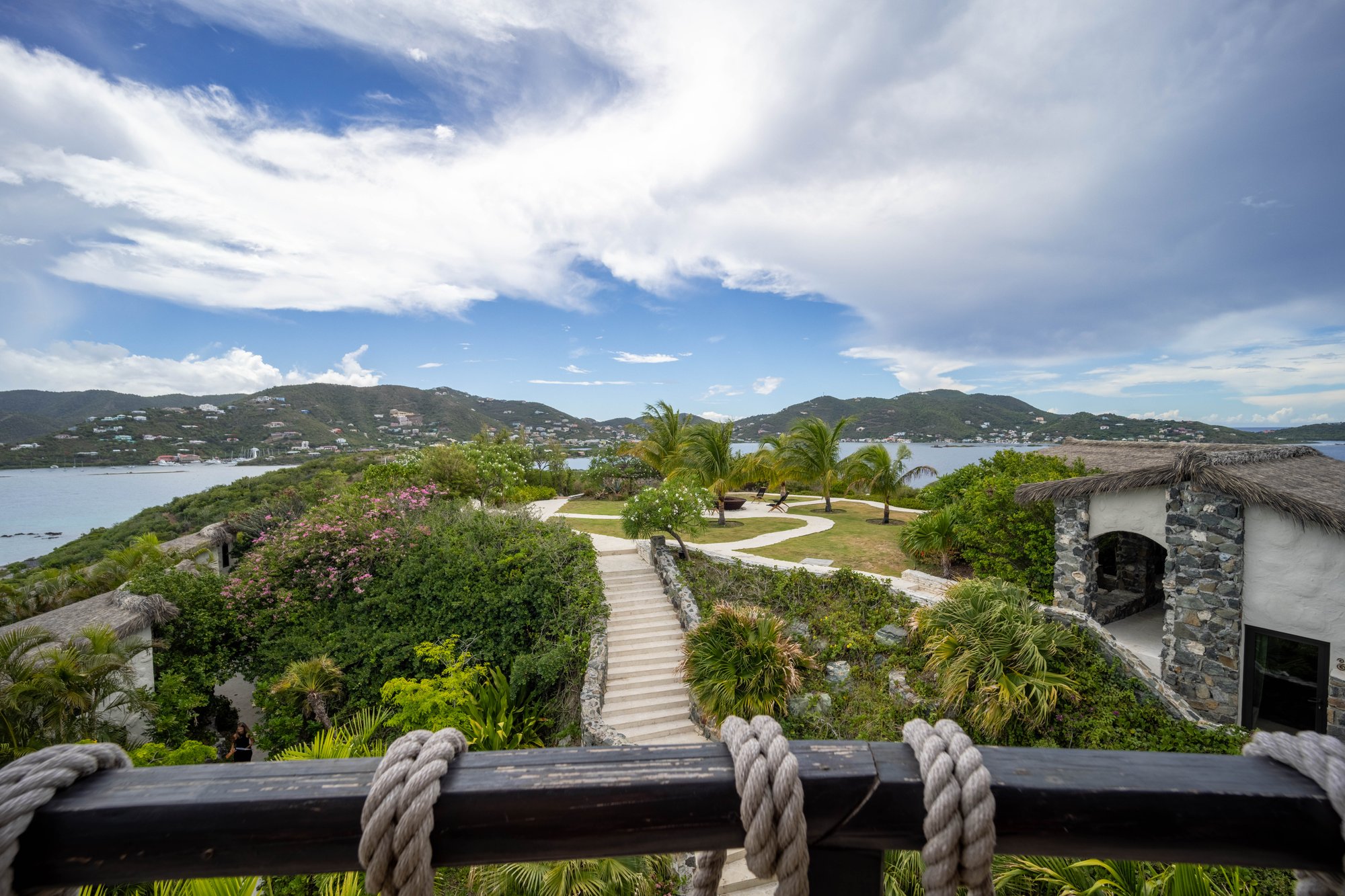 View of the island grounds and neighboring hills from a room balcony at The Aerial, BVI