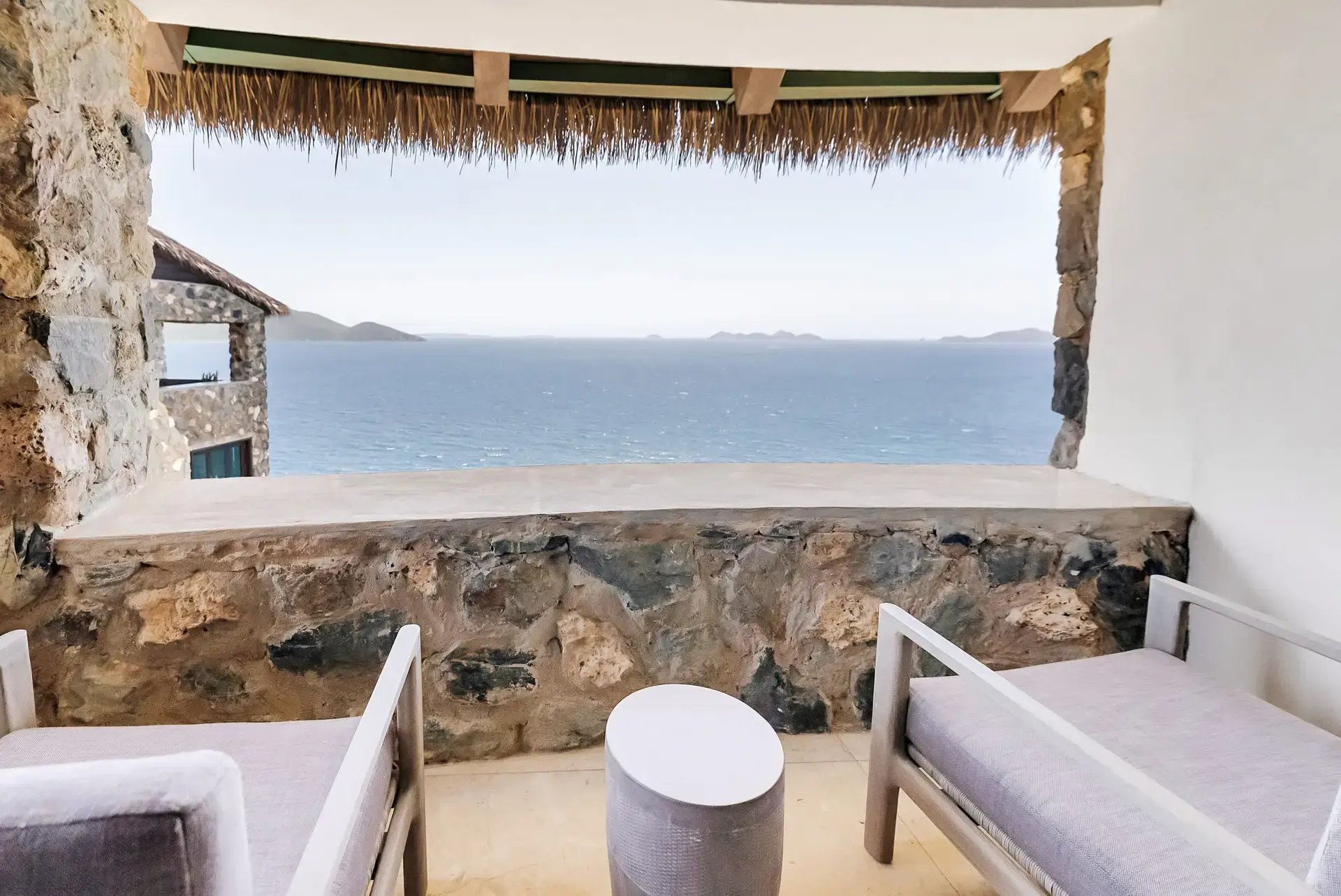 Private balcony seating with ocean view at The Aerial, BVI