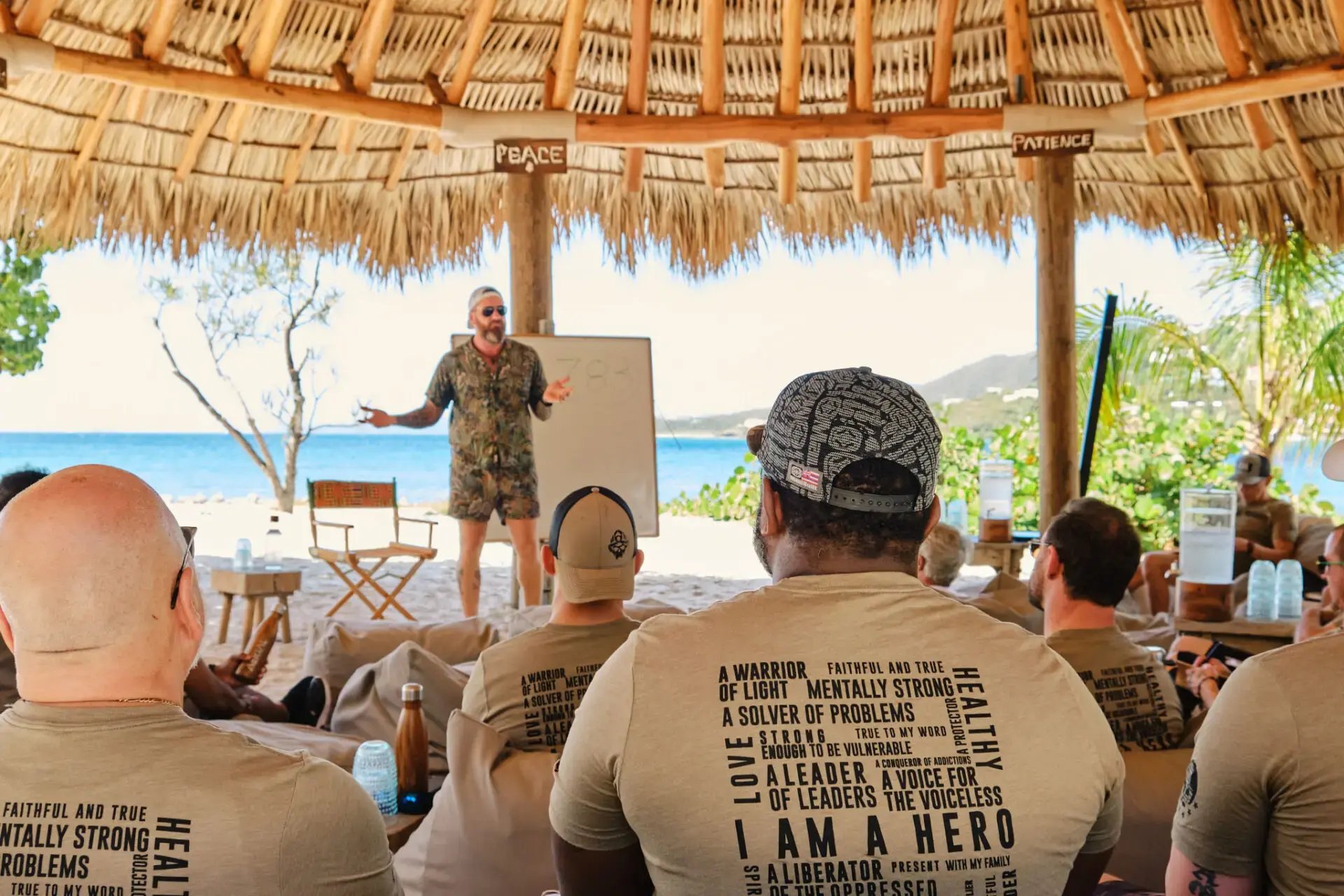 Speaker addressing a group during a Heal the Heroes program at The Aerial, BVI