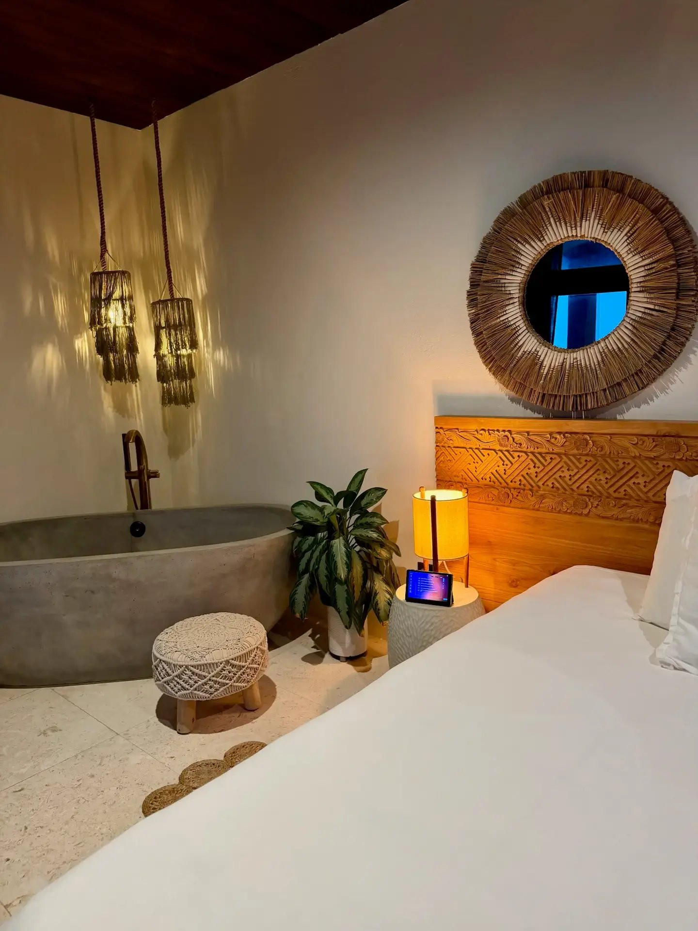 Bedroom interior with Zen Vein wellness technology at bedside.