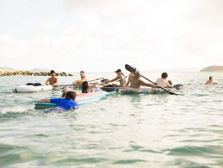 Guests paddleboarding in the water at The Aerial, BVI