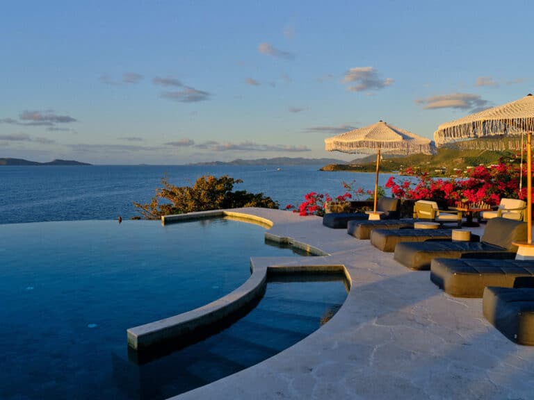 Infinity pool terrace at sunset overlooking the ocean