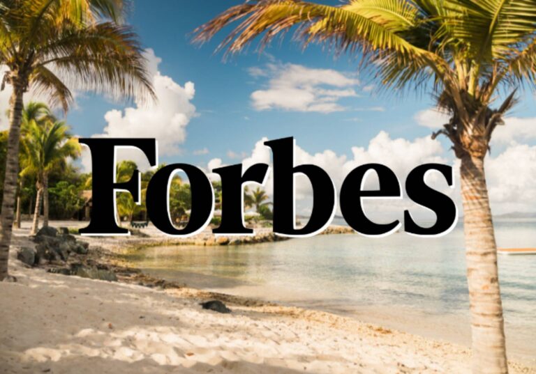 Forbes logo overlaid on a tropical beach image