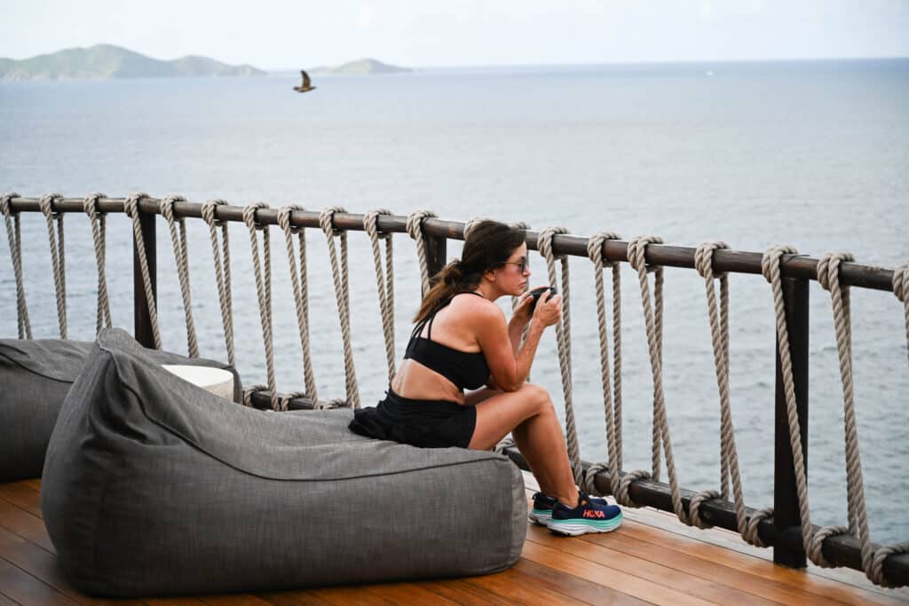 woman sipping tea during a mindfulness retreat